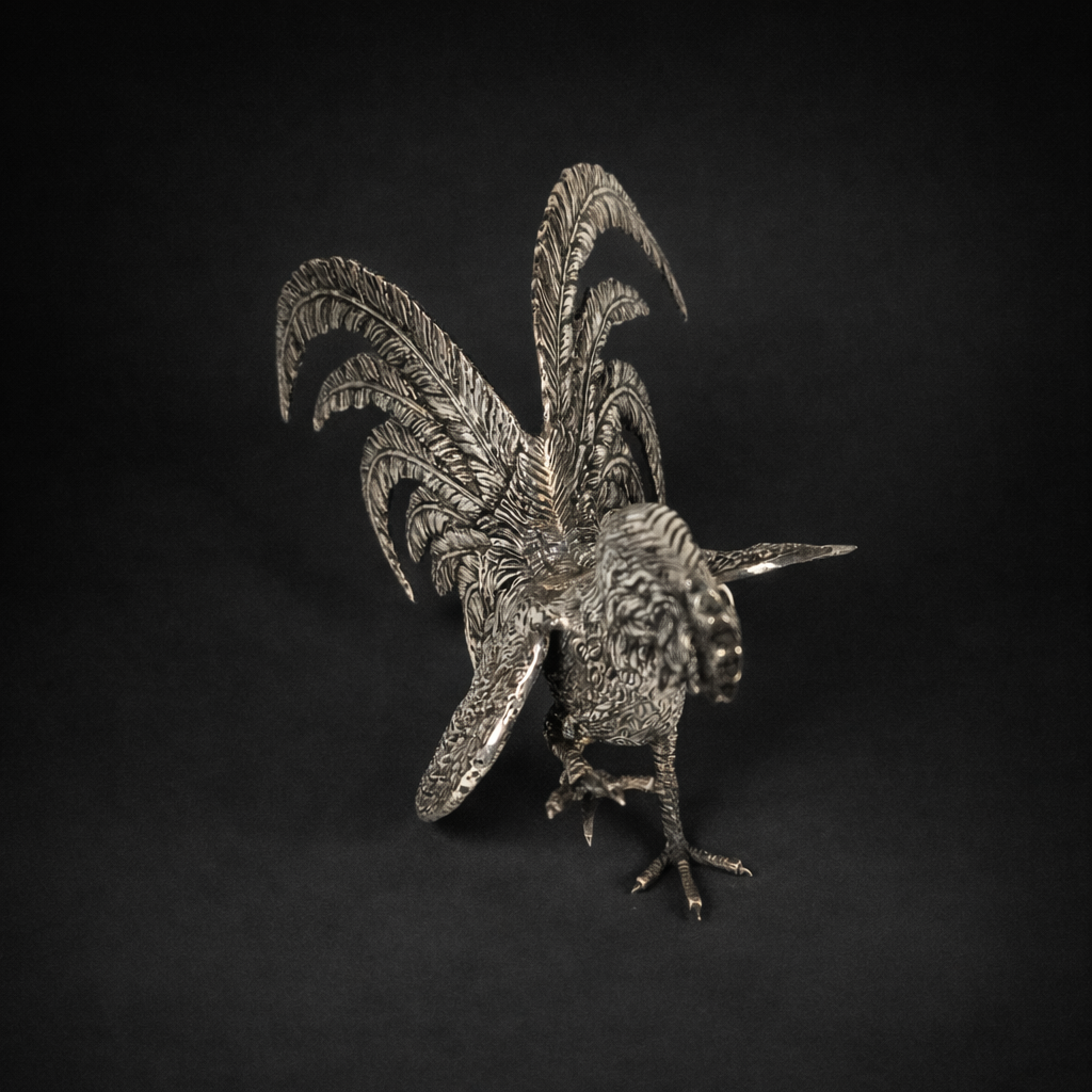 Pareja de gallos en bronce plateado. Pareja de gallos en bronce plateado.