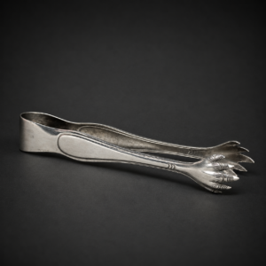 Pinza para hielos Eberle, garra plateada, ca. 1930.