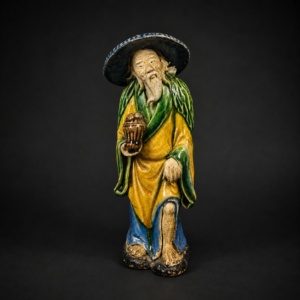 Figura oriental en cerámica vidriada, ca. 1930.