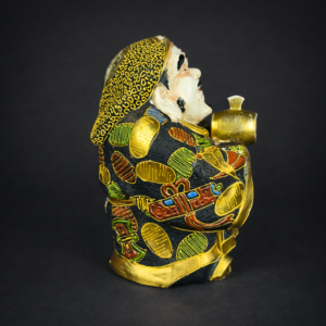 Figura japonesa de Daikoku en estilo Satsuma, ca. 1940.