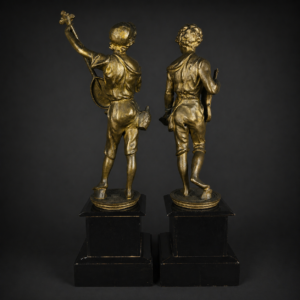 Pareja de músicos callejeros en metal dorado francés, ca. 1880. Pareja de músicos callejeros en metal dorado francés, ca. 1880.