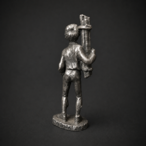 Figura de trabajador rural en metal plateado, ca. 1930.
